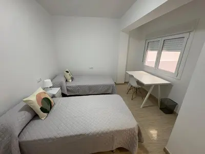 Cama o camas de una habitación en apartamento san urbano