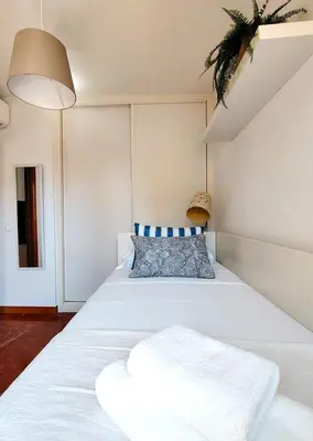 Cama o camas de una habitación en Paseo de Almería Suites en pleno centro de Almería, 2 Hab