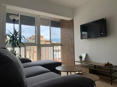 Una televisión o centro de entretenimiento en Apartamento a 2 min de la playa - 3 dormitorios - WIFI - Totalmente equipado