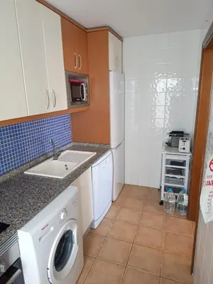 Una cocina o zona de cocina en Bonito y cómodo apartamento