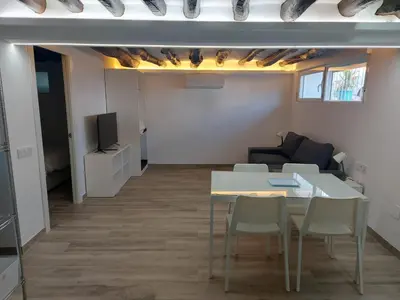 Una televisión o centro de entretenimiento en Villa Rosa