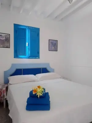 Cama o camas de una habitación en Larimar
