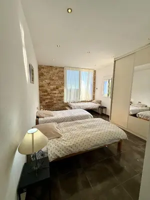 Cama o camas de una habitación en Cortijo Maya, maison troglodyte pour 10 personnes