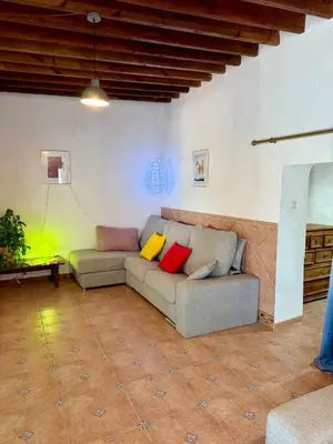Zona de estar de Cortijo Maya, maison troglodyte pour 10 personnes