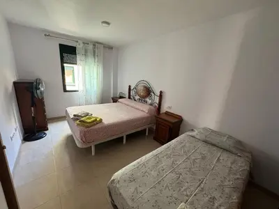 Cama o camas de una habitación en apartamento vacacional roquetas de mar