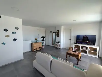 Una televisión o centro de entretenimiento en Terrazas Del Pozo 5