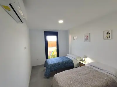 Cama o camas de una habitación en Terrazas Del Pozo 5