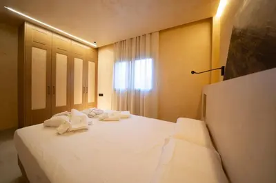 Cama o camas de una habitación en Hotel Boutique MANANTIAL DE CELA