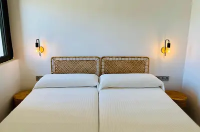 Cama o camas de una habitación en Altos de Vera I- Vistas increíbles al campo de golf de Valle del Este