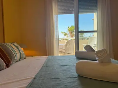 Cama o camas de una habitación en Sunset Beach Front