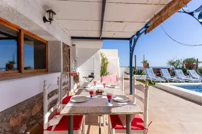 Un balcón o terraza de Blue House I Pool I Art I BBQ I Peace I Relax