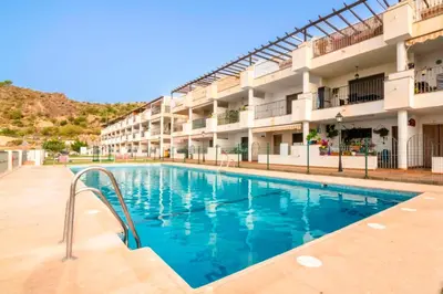 Piscina en o cerca de Acogedor apartamento con terraza y vistas al mar