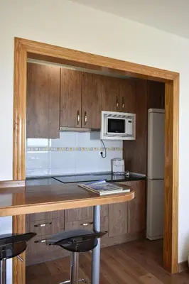 Una cocina o zona de cocina en Acogedor apartamento con terraza y vistas al mar