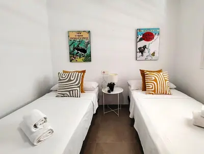 Cama o camas de una habitación en Mar y Sal 8, 1º Línea de playa, 2 hab, terraza con vistas al mar y garaje