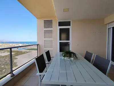 Un balcón o terraza de Mar y Sal 8, 1º Línea de playa, 2 hab, terraza con vistas al mar y garaje