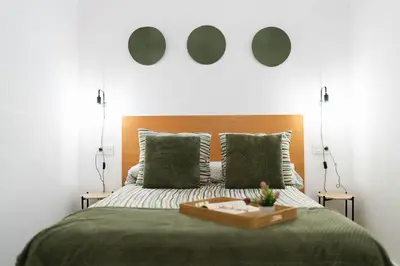 Cama o camas de una habitación en Elegante loft en Almería con zona de trabajo