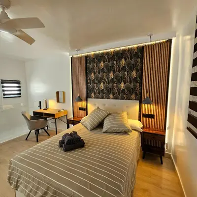 Cama o camas de una habitación en Encantador apartamento y terraza