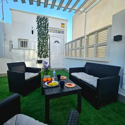 Zona de estar de Encantador apartamento y terraza
