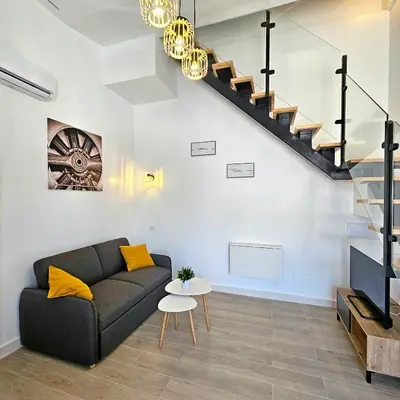Zona de estar de Encantador apartamento y terraza