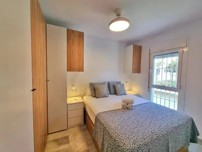 Cama o camas de una habitación en Apto PLAYA SOL y MAR, Retamar, Cabo de Gata