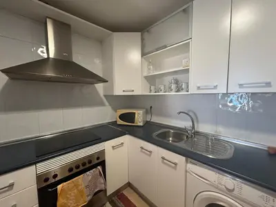 Una cocina o zona de cocina en Apartamento con Terrazas y vistas al mar