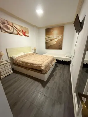 Cama o camas de una habitación en Apartamento marina de la torre