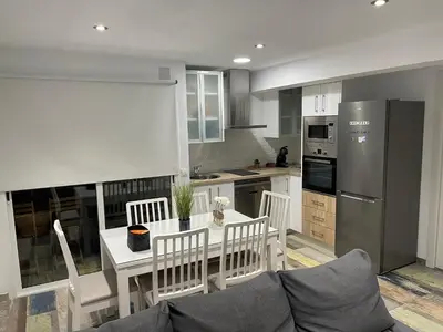 Una cocina o zona de cocina en Apartamento Urba Roquetas