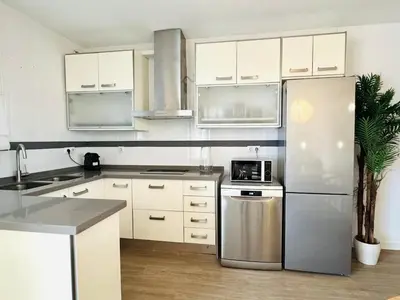 Una cocina o zona de cocina en New Premium Ático Roquetas Beach