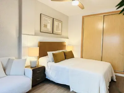 Cama o camas de una habitación en New Premium Ático Roquetas Beach