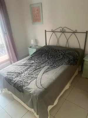 Cama o camas de una habitación en Apartamento en primera línea de playa Jardines de Nuevo Vera, Vera Playa, Almeria