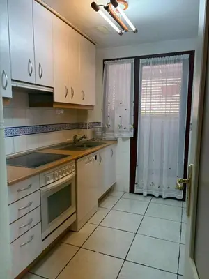 Una cocina o zona de cocina en Apartamento en primera línea de playa Jardines de Nuevo Vera, Vera Playa, Almeria