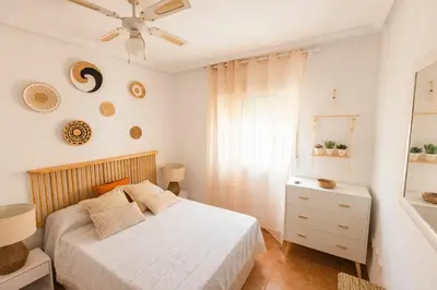 Cama o camas de una habitación en Bohemian apartment with pool 180m from Mojacar beach