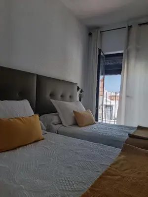 Cama o camas de una habitación en La Troje Pensión