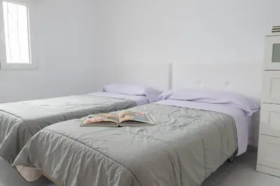 Cama o camas de una habitación en Casa en Almería