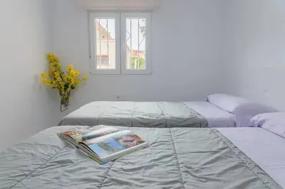 Cama o camas de una habitación en Casa en Almería