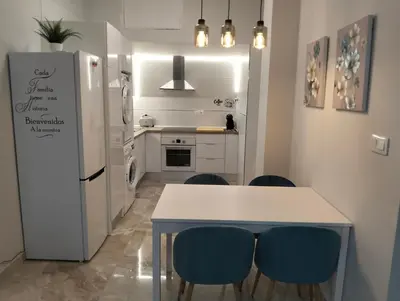 Una cocina o zona de cocina en APARTAMENTO SOL - 2 apartamentos céntricos juntos cerca de la playa, ideales para grupos grandes