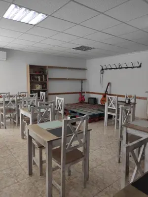 Un restaurante o sitio para comer en Hostal Taberno