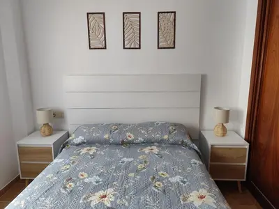 Cama o camas de una habitación en Apartamento Vera playa, Entre Sol y Salinas