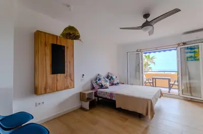 Cama o camas de una habitación en Levante 24 Estudio Naturista primera línea