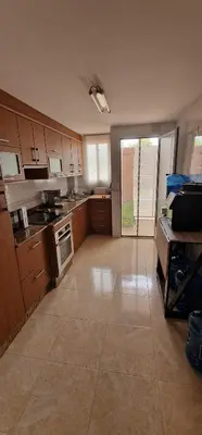 Una cocina o zona de cocina en Piso con piscina en Aguilas Murcia