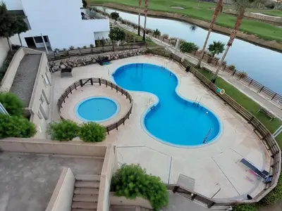 Piscina en o cerca de Cómodo apartamento en Pulpí, 2 dormitorios, cerca de Playa Encuentro - ES-376-37