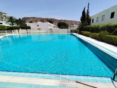 Piscina en o cerca de Oliveros Playa Suites, terraza exclusiva con vistas al mar