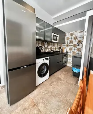 Una cocina o zona de cocina en Frente a la ISLA