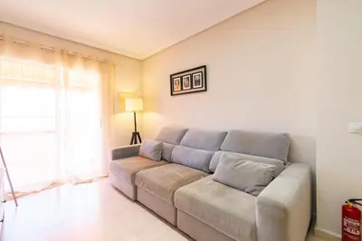 Zona de estar de Apartamento con Terraza, Piscina y Parking By Aloha Palma