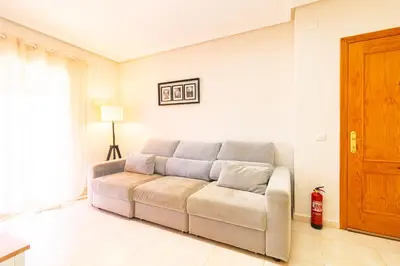Zona de estar de Apartamento con Terraza, Piscina y Parking By Aloha Palma