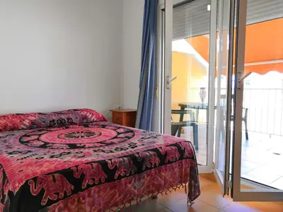 Cama o camas de una habitación en Ático centro-playa de poniente