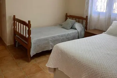 Cama o camas de una habitación en Casa Bueno- Sleeps 7 Private Pool & AirCon