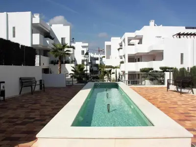 Piscina en o cerca de Encantador apartamento en San Juan de los Terreros con jardín y piscina comunitaria - ES-376-21