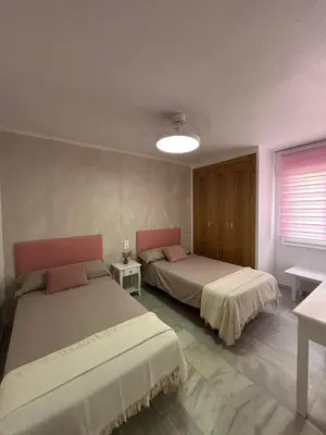 Cama o camas de una habitación en APARTAMENTO LUXURY Golf Center