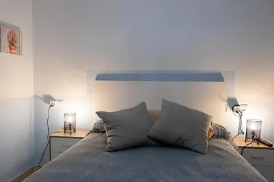 Cama o camas de una habitación en Apartamento Almerimar primera linea de playa